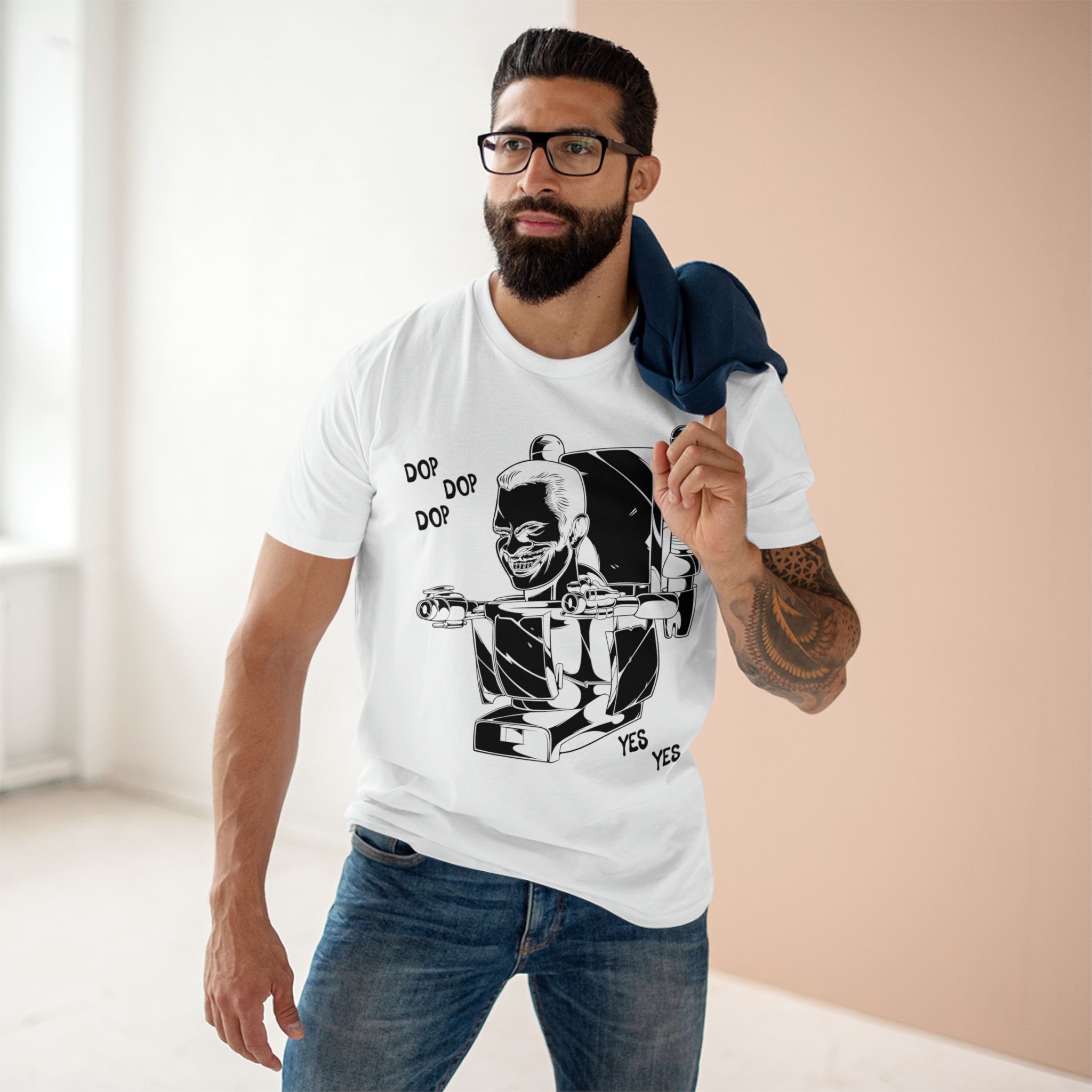 White tee with minimalistic G Man pop art on male model with glasses in room