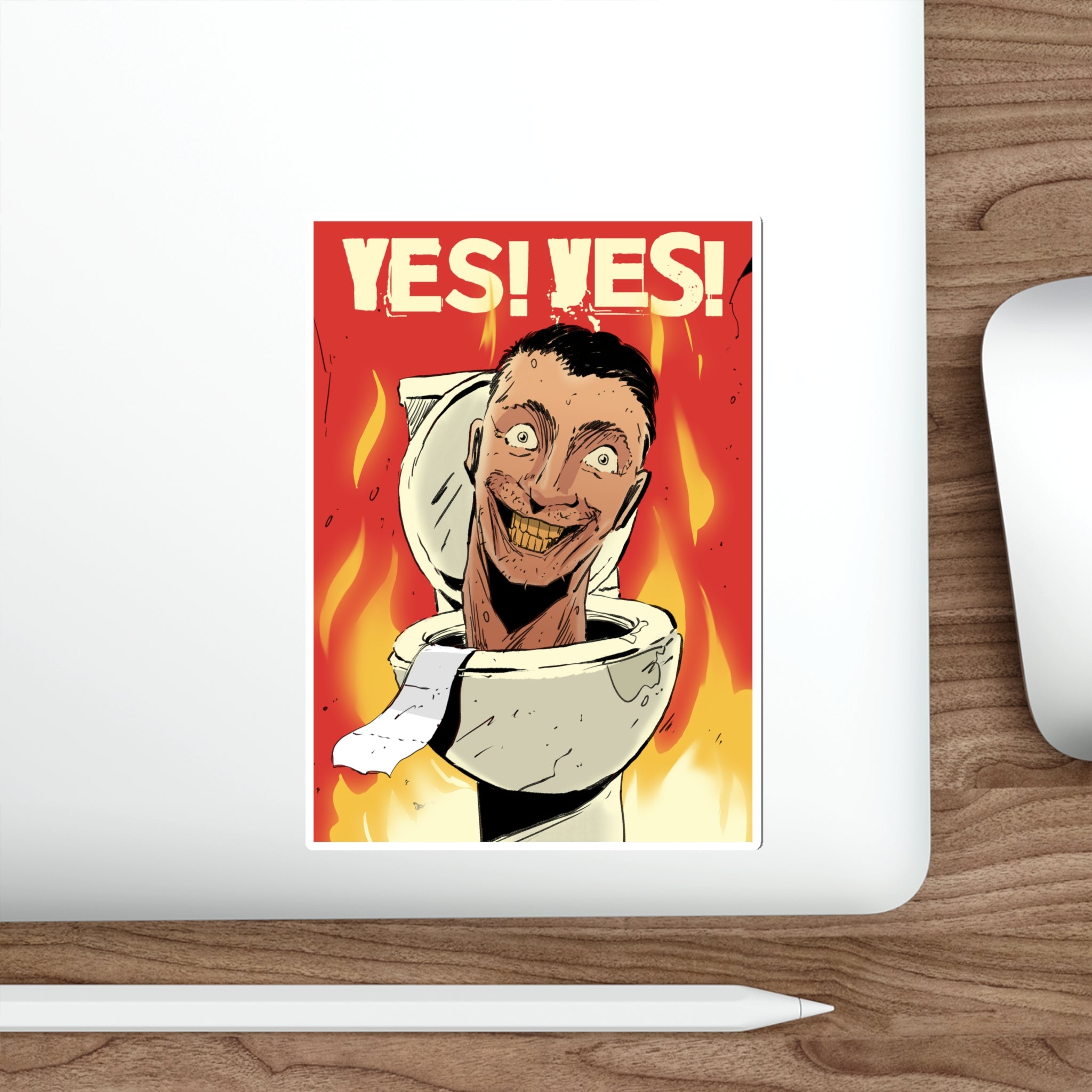Yes! Yes! Sticker Skibidi toilet surrounded by flames on a sticker on laptop with wooden desk mouse and apple pen
